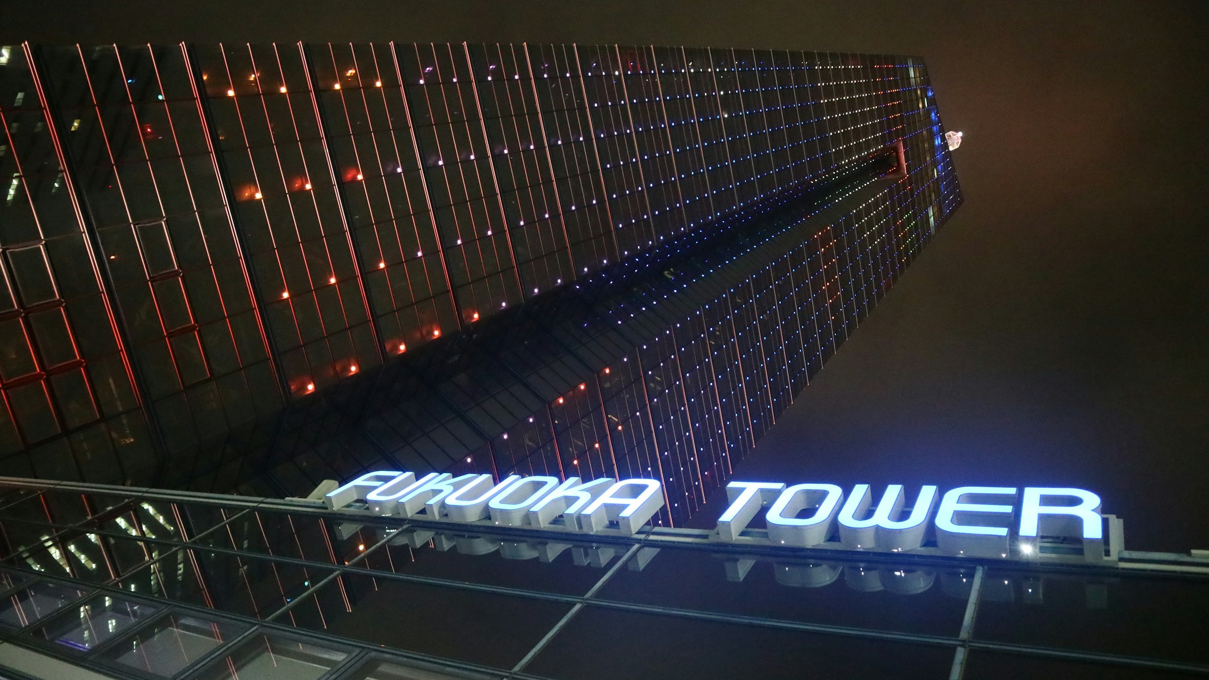Fukuoka Tower illuminated at night