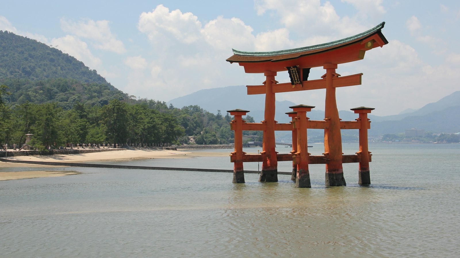 The floating torii gate of Itsukushima Shrine standing in the water off Miyajima