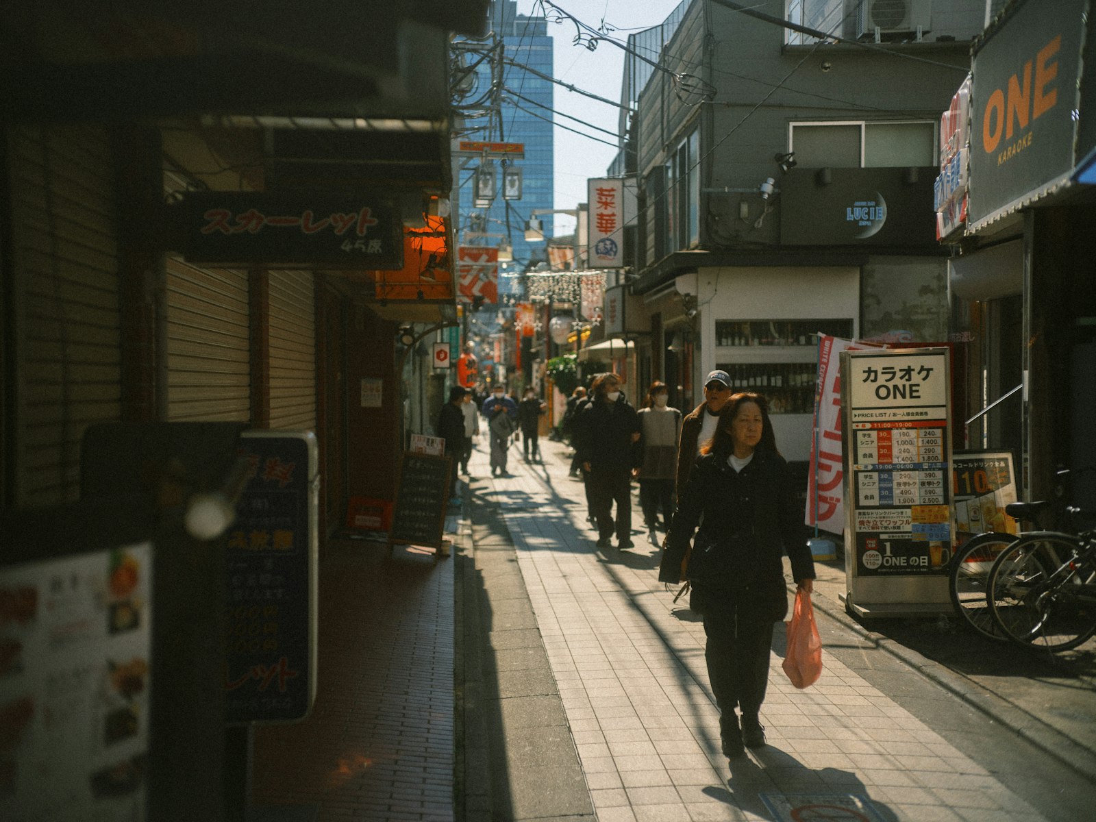 A busy, sunlit street in Tokyo